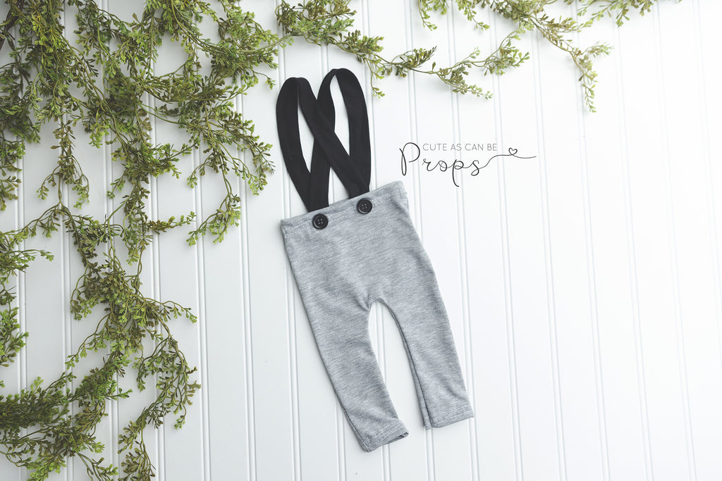 newborn black suspenders with gray pants