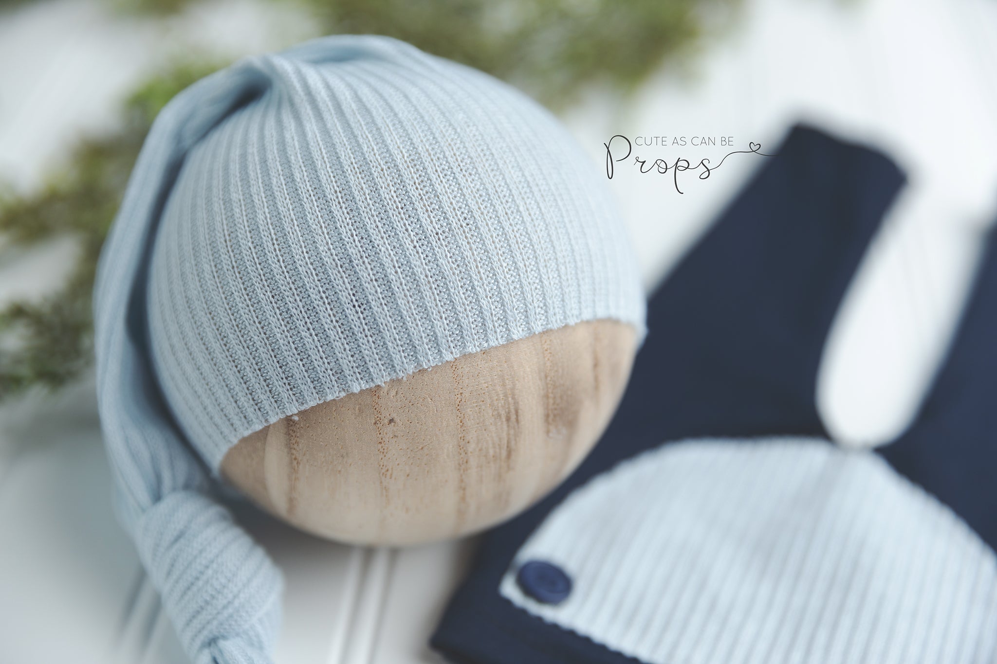 navy newborn pants and light blue sleepy hat set